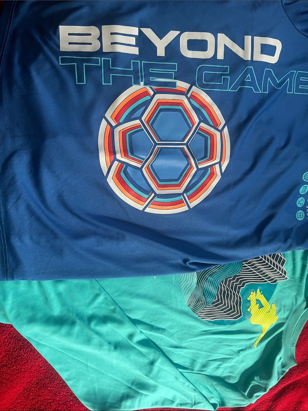 Athletic Works Blue Tee with Teal Accent and Multicolor Soccer Graphic